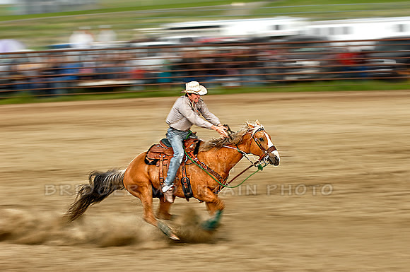 A panning shot of a cowboy during the Wilsall Rodeo