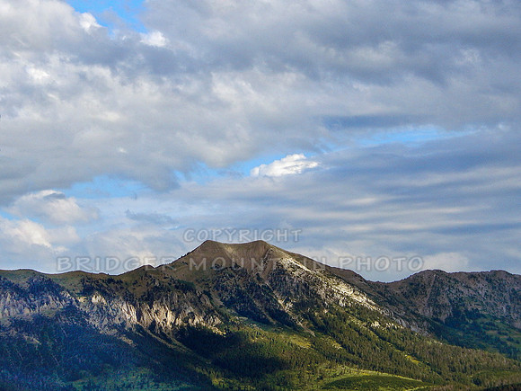 Pretty clouds above Saddle Peak of the Bridger Mountains at sunrise