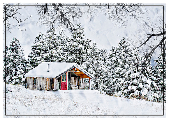 Snowy Cabin in the woods