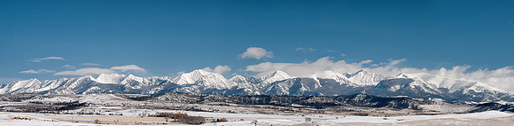 The Crazy Mountain Range covered in snow.